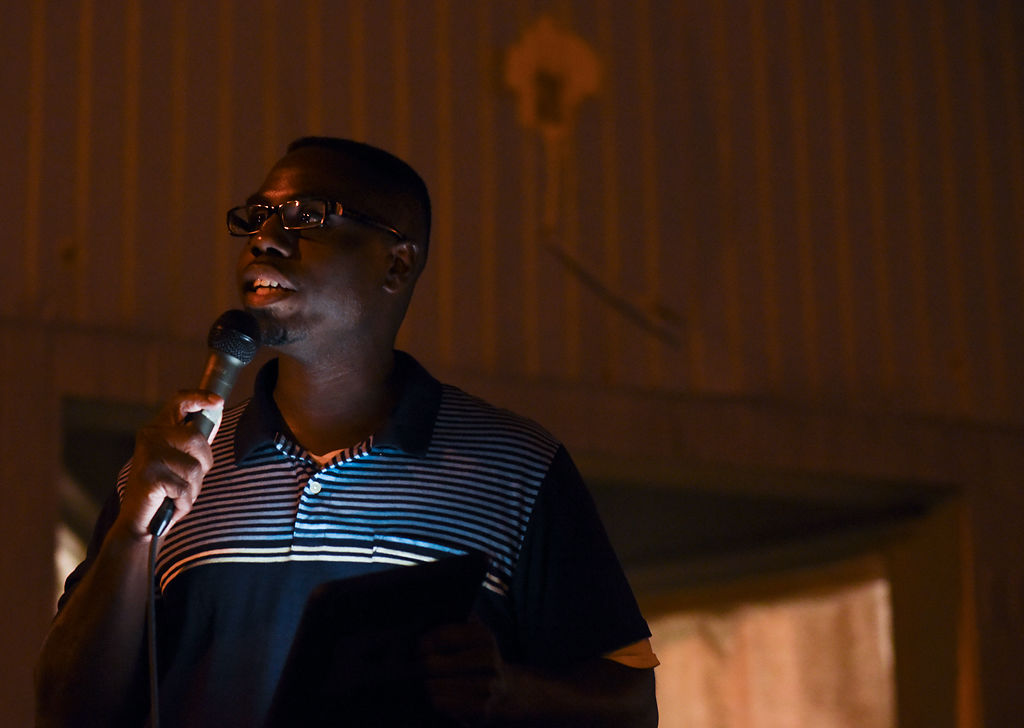 Pastor Melvin Stapleton leads the Peace in the Streets Prayer and Fellowship Vigil that he organized